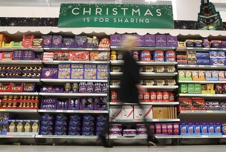 A woman shops at a Sainsbury's store in London, in this file photograph dated December 3, 2015. REUTERS/Neil Hall/files