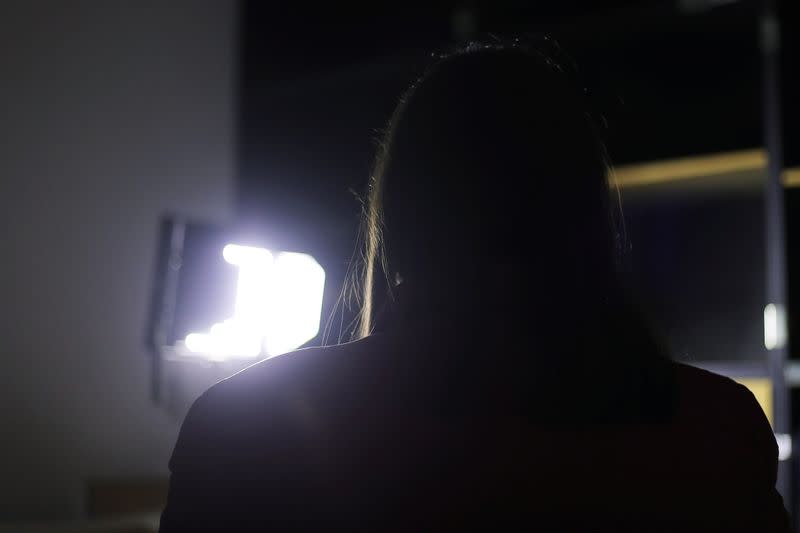 Silhouette of Sara, 26, member of LGTB community is pictured during an interview in Tirana