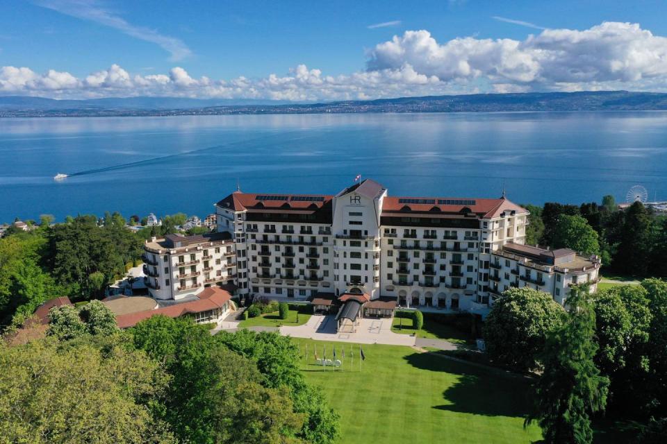 a large building by the water