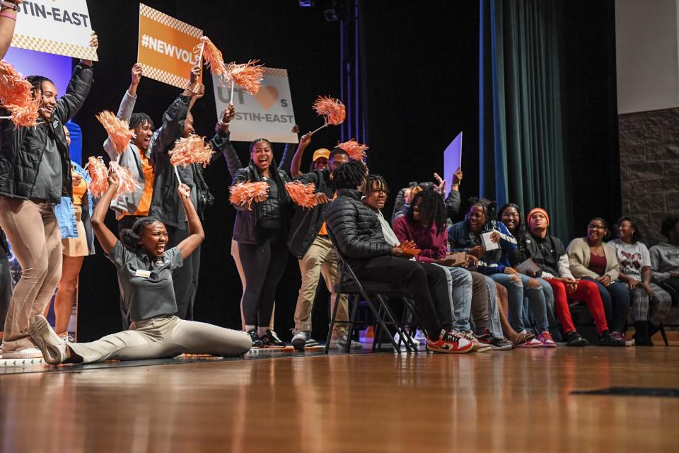 University of Tennessee at Knoxville students congratulate Austin-East Magnet High School seniors as they're surprised Nov. 17.