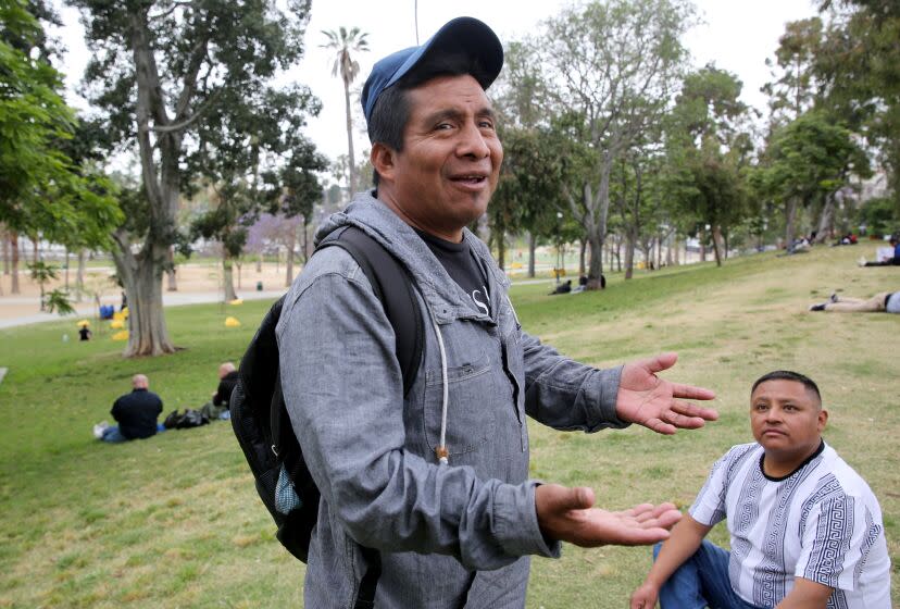 Miguel Angel Nicolas, a Guatemalan native, tells his story of how he recently arrived in Los Angeles after four months in Customs and Border Protection custody at various locations from Arizona to California, at McArthur Park in Los Angeles on Thursday, June 5, 2023. Nicolas has two sons in Los Angeles, so he was happy to be released here. Nicolas is living at a shelter in downtown Los Angeles while working evenings.