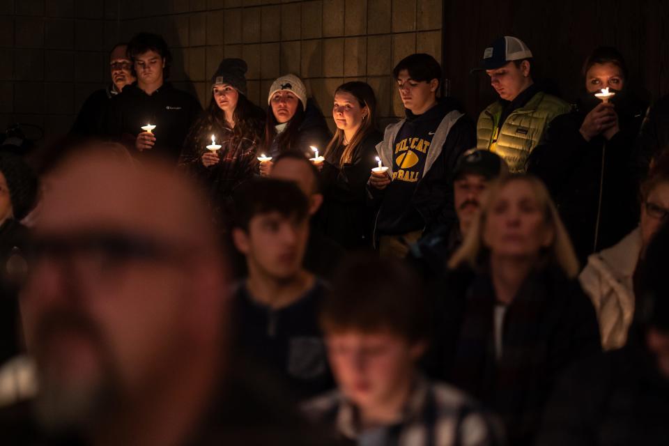 Community members gather during a prayer vigil at LakePoint Community Church in Oxford following an active shooter situation at Oxford High School in Oxford on November 30, 2021. Police took a suspected shooter into custody and there were multiple victims, the Oakland County Sheriff's office said.