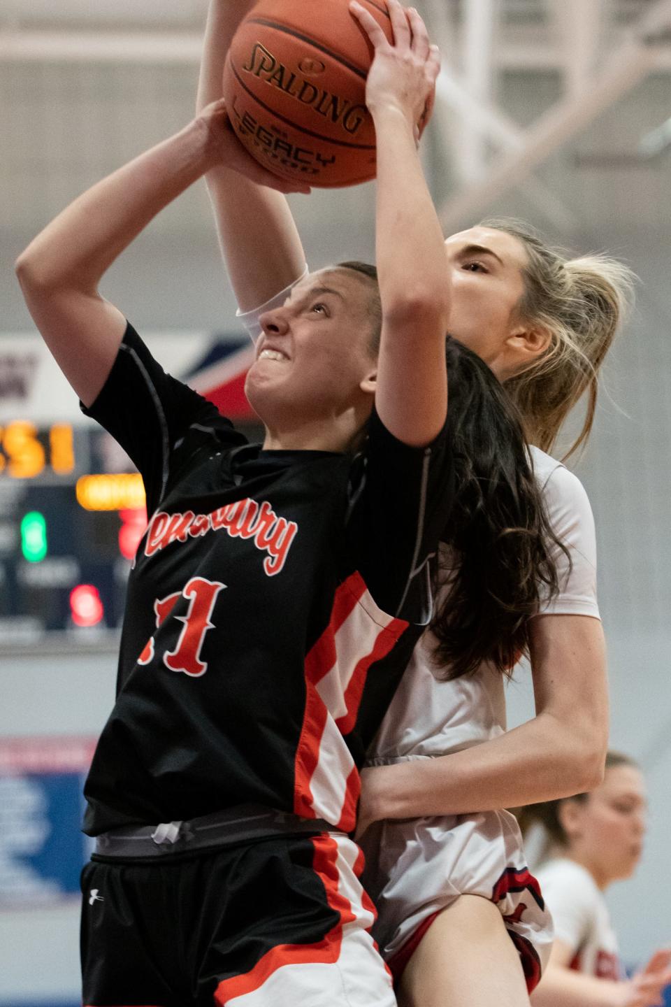 Pennsbury's Sofia Vitucci shoots while covered by Plymouth Whitemarsh's Erin Daley in a District One Class 6A semifinal game, on Wednesday, March 2, 2022, at Plymouth Whitemarsh High School. The Colonials defeated the Falcons 47-36 to move on to the district title game.