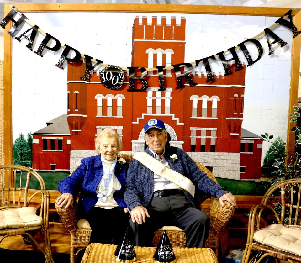 John and Mary Stellitano (known as Guy and Mimi to their families) celebrate his 100th birthday at a public reception at the Westerly Armory on March 25. John and Mary, 98, will celebrate their 79th wedding anniversary later this month. The banner he wears reads “Aged to Perfection.”