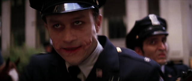 David Dastmalchian stands behind Heath Ledger&#39;s Joker in The Dark Knight (Warner Bros.)