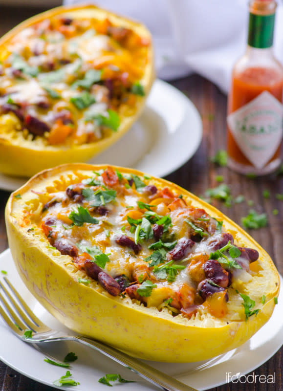 <p>iFOODreal</p><p>Tex Mex spaghetti squash boats are vegetarian and gluten free. You will love these healthy spaghetti squash boats even if you never tried spaghetti squash before.</p><p><a href="http://ifoodreal.com/tex-mex-spaghetti-squash-boats-recipe/" rel="nofollow noopener" target="_blank" data-ylk="slk:Get the recipe here!;elm:context_link;itc:0;sec:content-canvas" class="link rapid-noclick-resp"><em><strong>Get the recipe here!</strong></em></a></p>