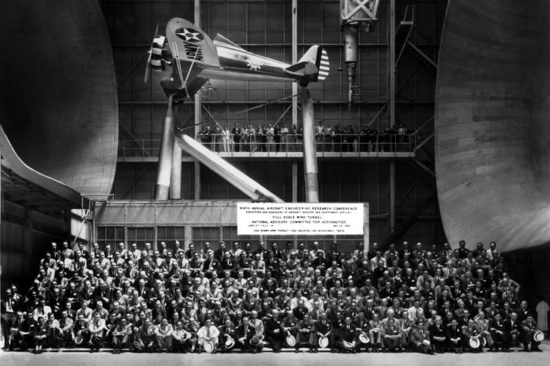 Orville Wright, Charles Lindbergh and Howard Hughe attend the 1934 Aircraft Engineering Research Conference at Langley Research Center's Full-Scale Tunnel. On July 27, 1909, Wright set a record by staying aloft in a plane for 1 hour, 12 minutes, 40 seconds. File Photo courtesy of NASA