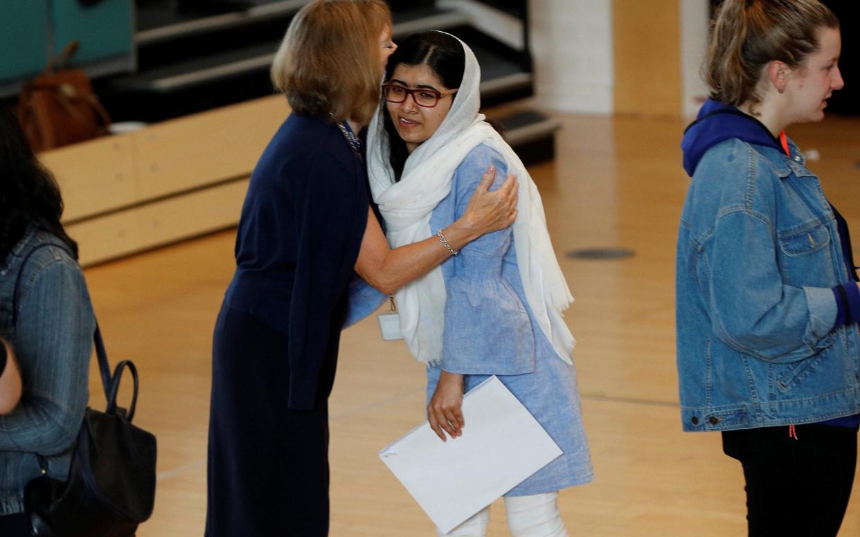 Malala receiving her results - REUTERS