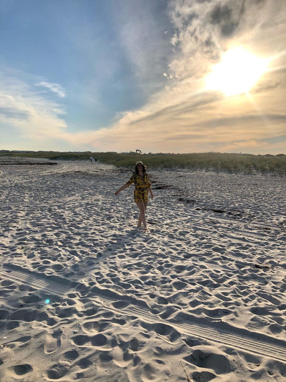 Gabi Stevenson in a yellow shirt at Long Beach Island