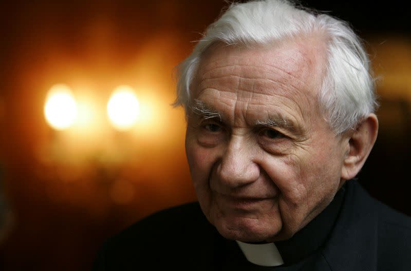 FILE PHOTO: Catholic Priest Georg Ratzinger, the 81-year-old brother of newly elected German Pope Benedict XVI, poses at his home in Regensburg