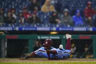 Philadelphia Phillies' Odubel Herrera scores on an RBI-sacrifice fly by Jean Segura during the third inning of a baseball game against the Pittsburgh Pirates, Thursday, Sept. 23, 2021, in Philadelphia. (AP Photo/Matt Slocum)