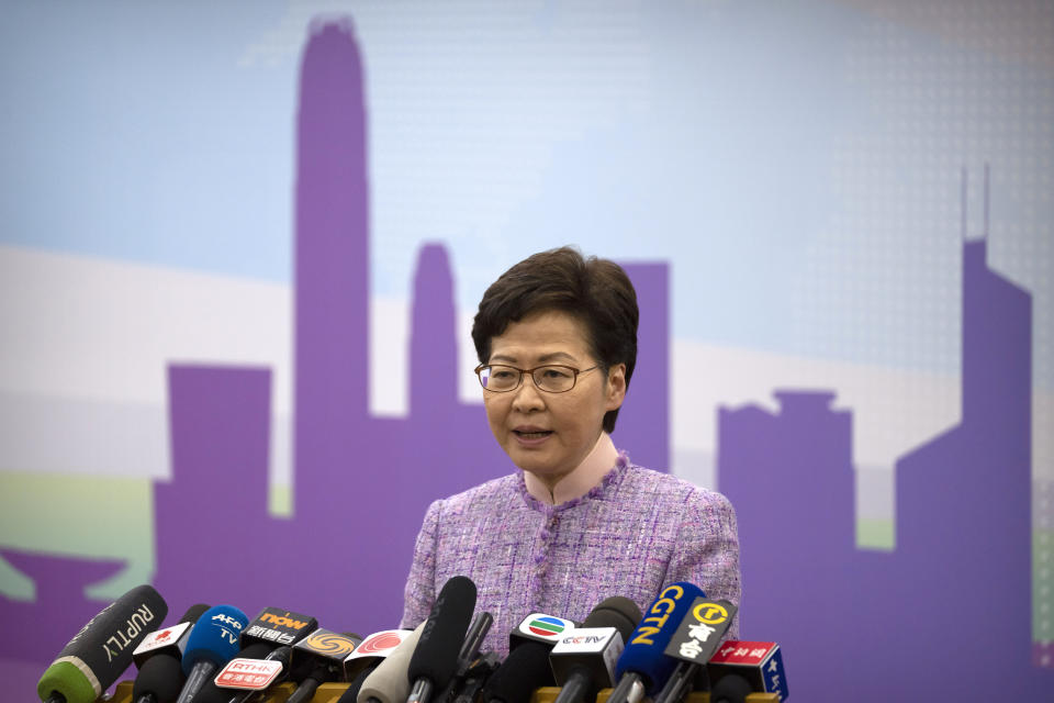 Hong Kong Chief Executive Carrie Lam speaks during a press conference in Beijing, Wednesday, Dec. 22, 2021. Hong Kong's leader Carrie Lam met with top leaders in Beijing on Wednesday to report to them on the territory's first legislative elections held under new laws ensuring that only "patriots" loyal to the ruling Chinese Communist Party could run as candidates. (AP Photo/Mark Schiefelbein)