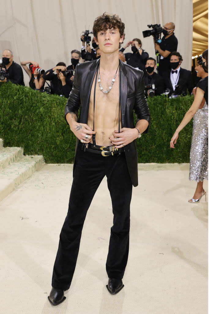 Bare-chested Shawn at the Met Gala stairs
