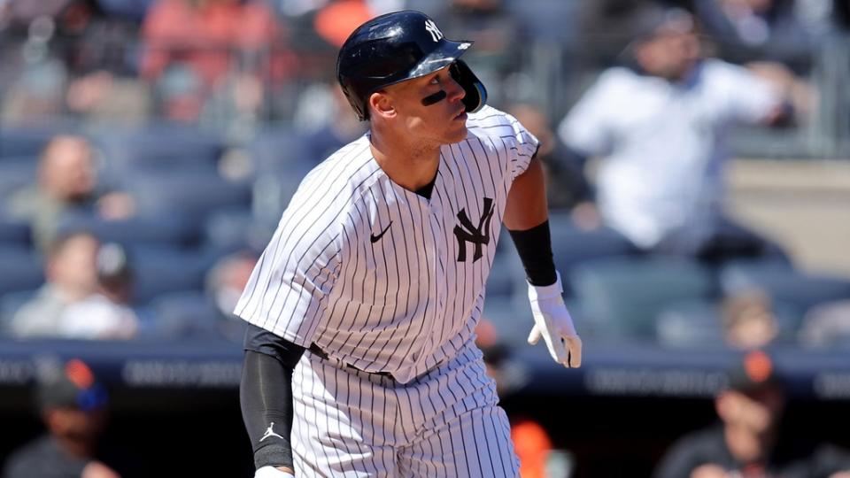 Mar 30, 2023; Bronx, New York, USA; New York Yankees center fielder Aaron Judge (99) watches his solo home run against the San Francisco Giants during the first inning at Yankee Stadium.