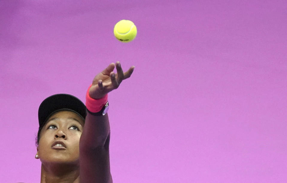 In this Sunday, Sept. 23, 2018, file photo, Naomi Osaka, of Japan, serves a ball against Karolina Pliskova, of Czech Republic during the final match of the Pan Pacific Open women's tennis tournament in Tokyo. (AP Photo/Eugene Hoshiko, File)