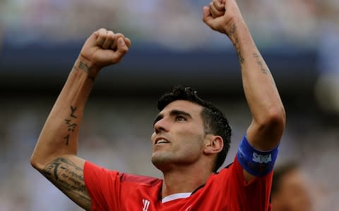 Sevilla's forward Jose Antonio Reyes celerates after scoring during the Spanish league football match Malaga CF vs Sevilla FC - Credit: Cristina Quicler / AFP