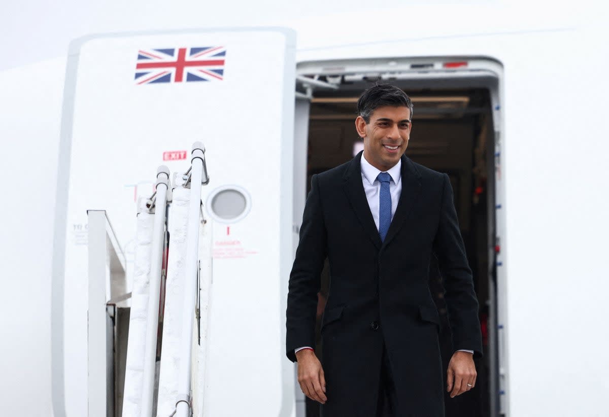 Rishi Sunak disembarks a plane at Riga International Airport, in Latvia (POOL/AFP via Getty Images)