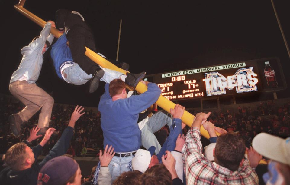 Nov. 9, 1996: Fans tear down the goal post on the south side of Liberty Bowl Memorial Stadium after the University of Memphis win over the University of Tennessee.