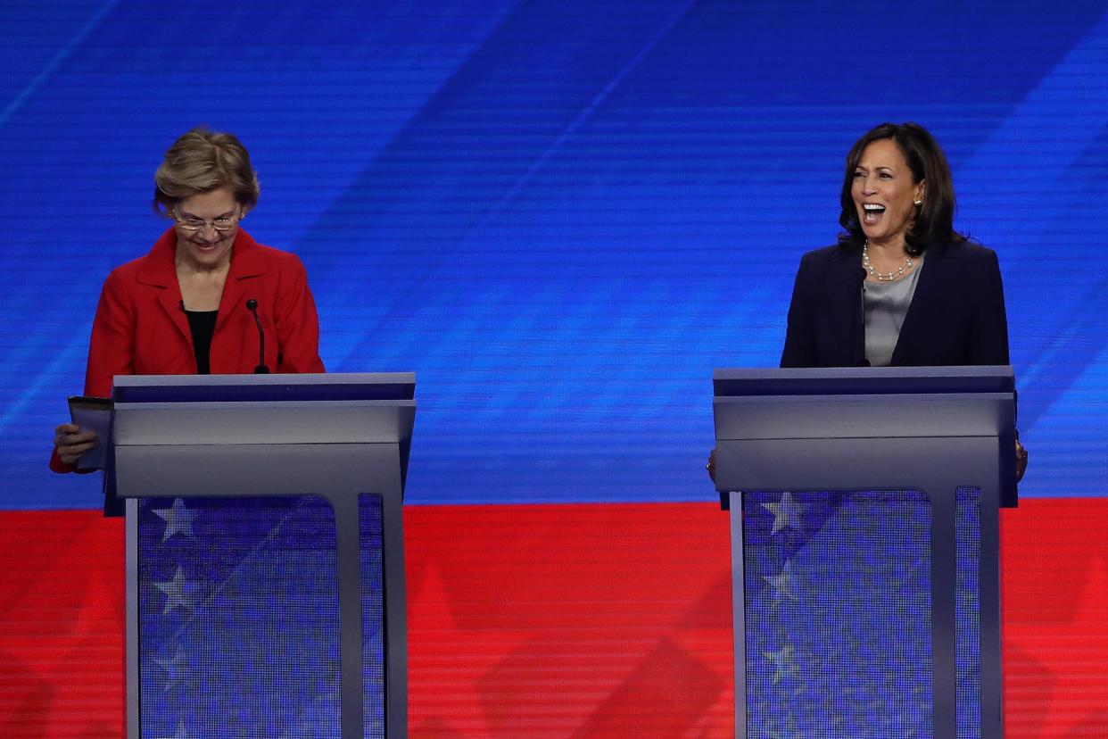 HOUSTON, TEXAS - SEPTEMBER 12: Democratic presidential candidates Sen. Elizabeth Warren (D-MA) and Sen. Kamala Harris (D-CA) laugh during the Democratic Presidential Debate at Texas Southern University's Health and PE Center on September 12, 2019 in Houston, Texas. Ten Democratic presidential hopefuls were chosen from the larger field of candidates to participate in the debate hosted by ABC News in partnership with Univision. (Photo by Win McNamee/Getty Images)