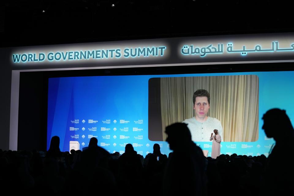 OpenAI CEO Sam Altman, seen on screen, talks on a video chat during the World Government Summit in Dubai, United Arab Emirates, Tuesday, Feb. 13, 2024. The CEO of ChatGPT maker OpenAI said Tuesday that the danger that keeps him awake at night regarding artificial intelligence are the "very subtle societal misalignments" that can make the systems wreck havoc. (AP Photo/Kamran Jebreili)