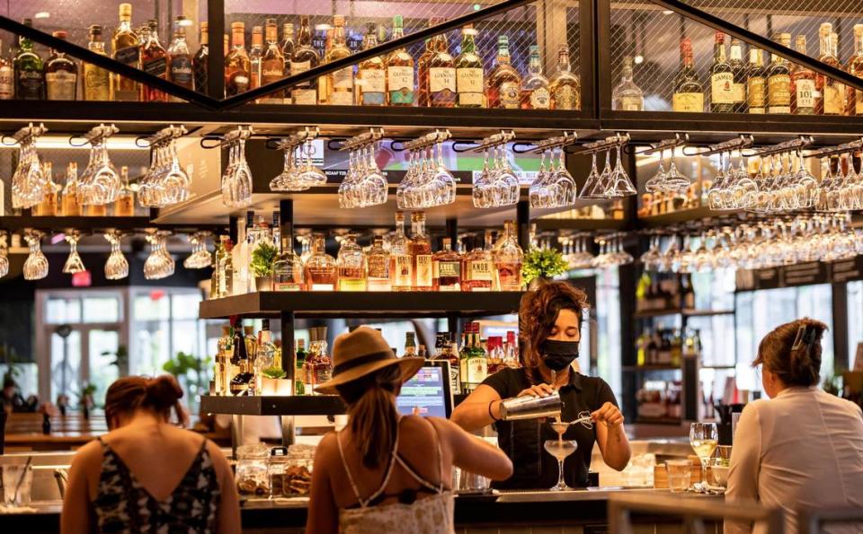 Bartender Susan Mendez prepares a drink at Time Out Market Miami in Miami Beach.