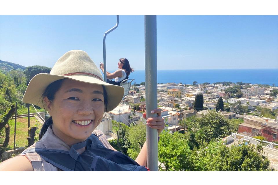 Writer Rachel Change riding the The Monte Solaro Chair Lift in Anacapri / Capri