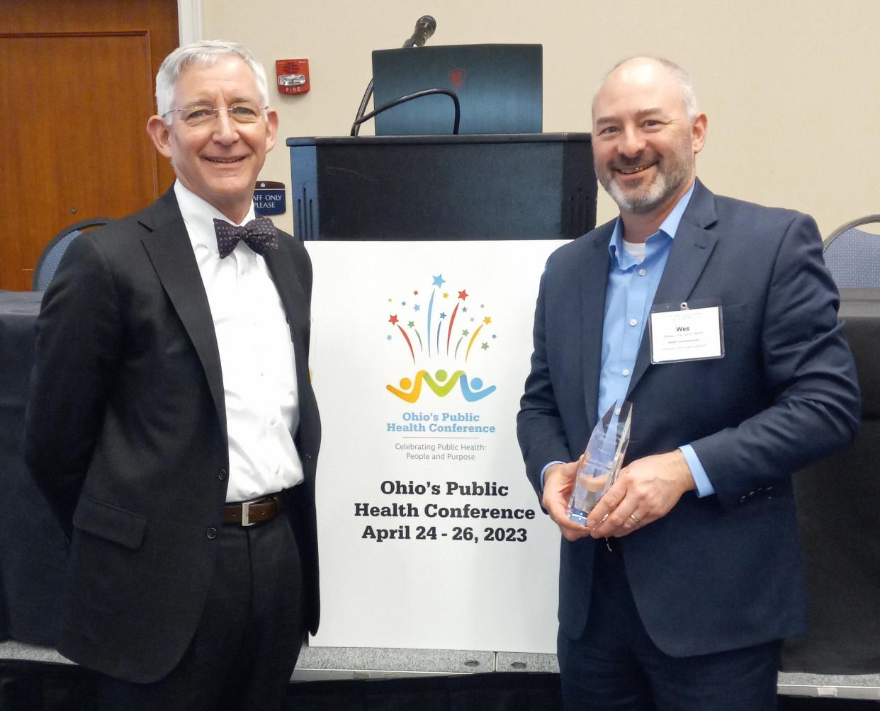 Dr. Bruce Vanderhoff, left, awarded Columbiana County Health District with his Directors Award at a recent event in Columbus. Dr. Wesley J. Vins, right, is director of the health district.