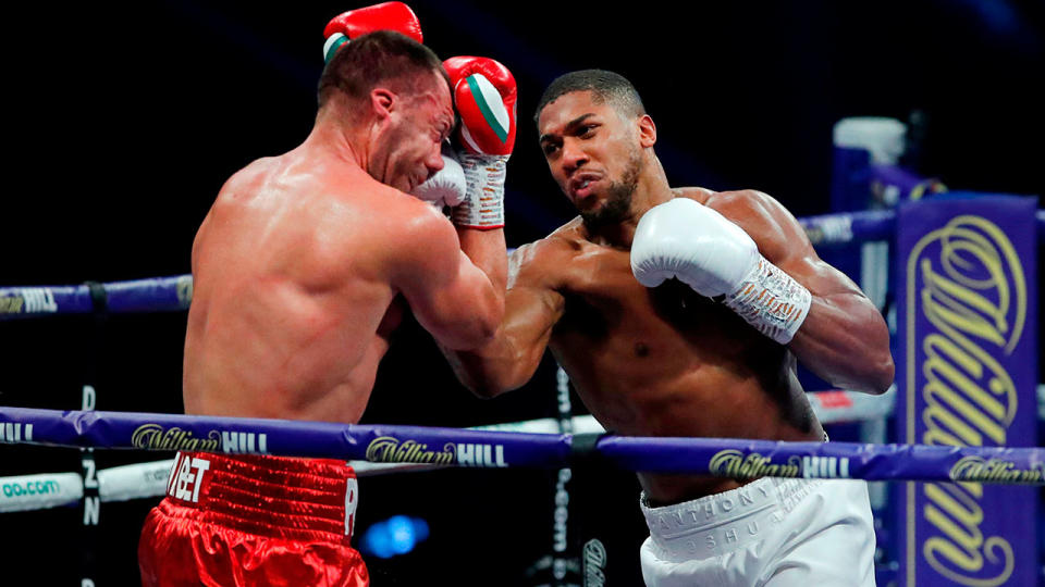 Anthony Joshua can be seen here catching Kubrat Pulev with a fierce right uppercut.