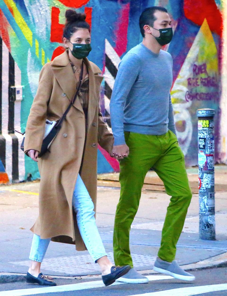 <p>Katie Holmes and boyfriend Emilio Vitolo Jr. hold hands as they walk to his restaurant in N.Y.C.’s Soho neighborhood on Tuesday. </p>