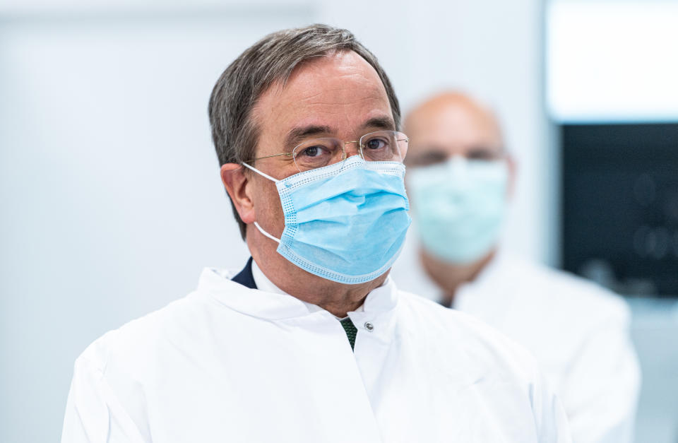 COLOGNE, GERMANY - JUNE 05: Armin Laschet, governor of the state of North Rhine-Westphalia, wearing a mask visits the Labor Dr. Wisplinghoff medical lab during the novel coronavirus crisis on June 05, 2020 in Cologne, Germany. The lab processes up to 10,000 coronavirus infection tests per day. North Rhine-Westphalia is one of Germany's largest states and has seen over 38,000 confirmed cases of infection and 1,600 deaths. (Photo by Lukas Schulze-Pool/Getty Images)