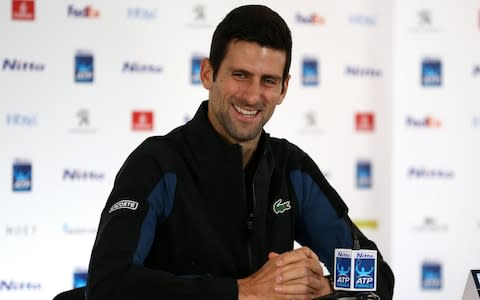 Novak Djokovic laughing at being asked about spending time with the Spice Girls on the Jonathon Ross Show - Credit: John Patrick Fletcher/Action Plus