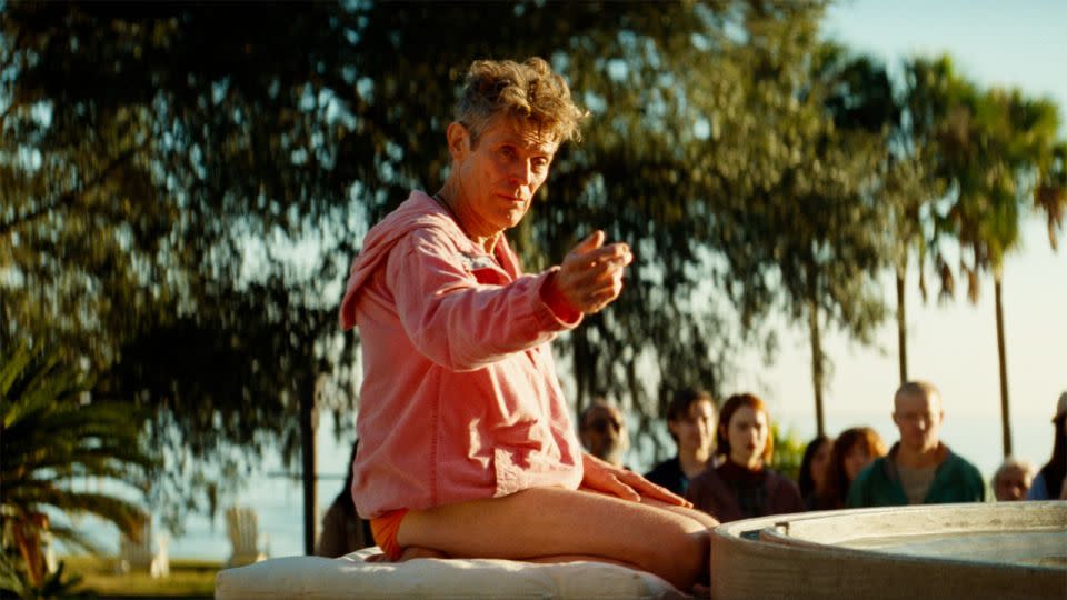 Dafoe as cult leader Omi, with disciples played by Stone and Plemons in the back of shot, in the third story of Yorgos Lanthimos' "Kinds of the Kindness." - Courtesy Searchlight Pictures