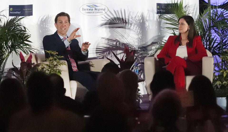Ben Sasse, with Lt. Gov. Jeanette Núñez at an event in Daytona Beach Tuesday, said he was convinced by ICI Homes Chairman Mori Hosseini, the University of Florida board chair, to leave the U.S. Senate and move to Gainesville to become the university's president.
