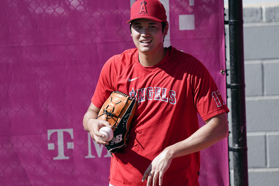 Los Angeles Angels starting pitcher Shohei Ohtani (17) warms up before a baseball game against the Atlanta Braves Tuesday, Aug. 1, 2023, in Atlanta. (AP Photo/John Bazemore)