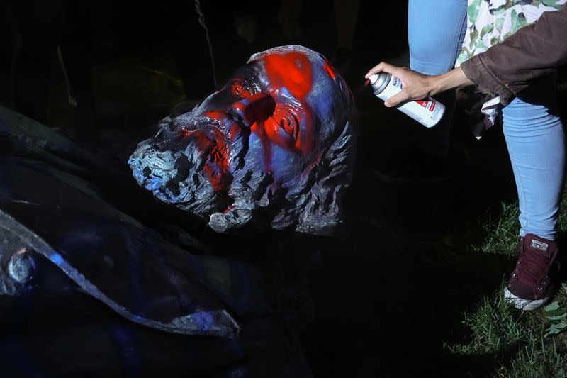 Protesters topple a statue of Albert Pike amid demonstrations and events on Juneteenth, which commemorates the end of slavery in Texas, in Washington