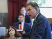 FILE - In this July 15, 2019, file photo, Oklahoma Attorney General Mike Hunter speaks during closing arguments in Oklahoma's ongoing opioid drug lawsuit against Johnson & Johnson, in Norman, Okla. An Oklahoma judge is expected to deliver a judgment following a first-of-its-kind trial in which the state is trying to hold an opioid drugmaker responsible for the devastating consequences of addiction to the powerful painkillers. (Photo/Sue Ogrocki, File)