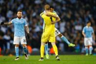 Football Soccer - Manchester City v Paris St Germain - UEFA Champions League Quarter Final Second Leg - Etihad Stadium, Manchester, England - 12/4/16 Manchester City's Joe Hart celebrates with Gael Clichy after the game Reuters / Darren Staples Livepic EDITORIAL USE ONLY.