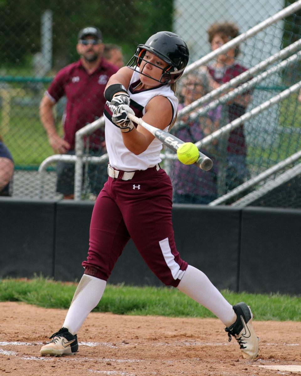 Lebanon center fielder Ella Teubner gets an RBI single in the OHSAA softball tournament game between Oak Hills and Lebanon high schools May 19, 2022, at Mason High School.