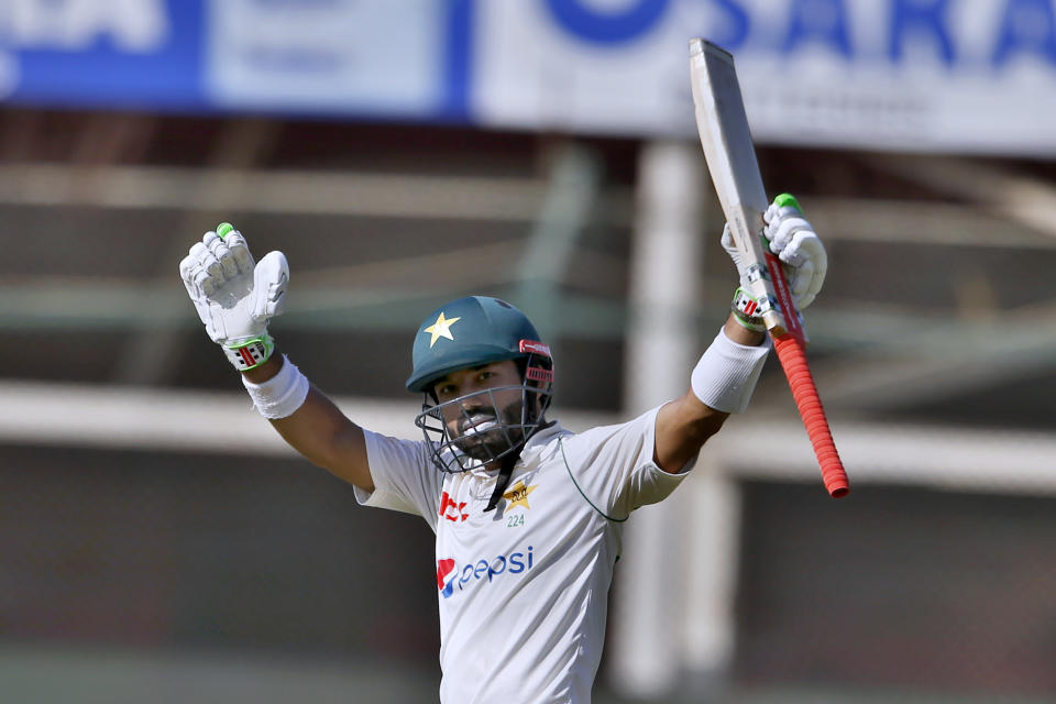Pakistan's Mohammad Rizwan celebrates after completing 50 runs on the fifth day of the second test match between Pakistan and Australia at the National Stadium in Karachi Pakistan, Wednesday, March 16, 2022. (AP Photo/Anjum Naveed)