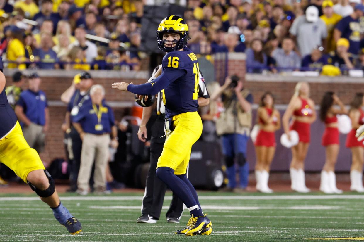 Aug 31, 2024; Ann Arbor, Michigan, USA; Michigan Wolverines quarterback Davis Warren (16) throws the ball against the Fresno State Bulldogs in the first half at Michigan Stadium. Mandatory Credit: Rick Osentoski-USA TODAY Sports