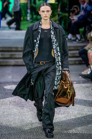 <p>Matteo Rossetti/Archivio Matteo Rossetti/Mondadori Portfolio/Getty</p> Mingus Lucien Reedus at the Versace fashion show on the second day of Milan Fashion Week Men's Collection Spring Summer 2023