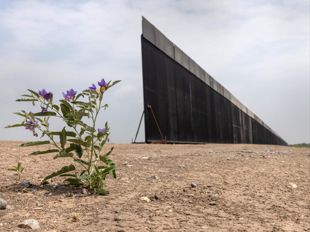 <p>A portion of US-Mexico border wall stands unfinished on April 14, 2021 near La Joya, Texas</p> (Getty Images)