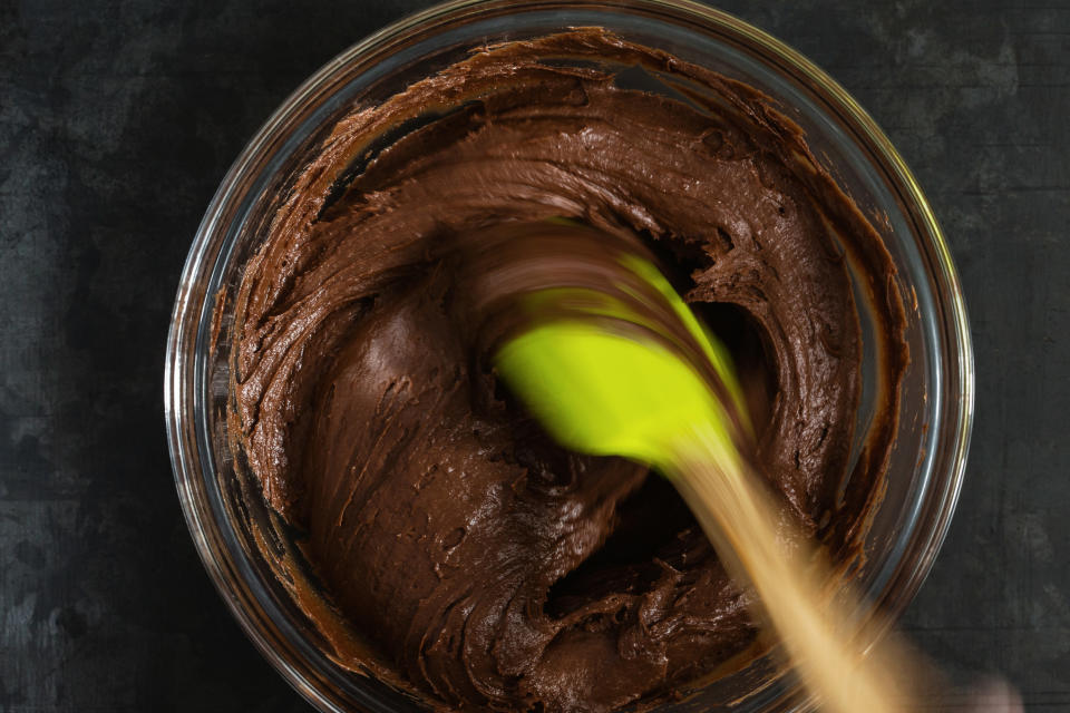 Mixing chocolate batter.