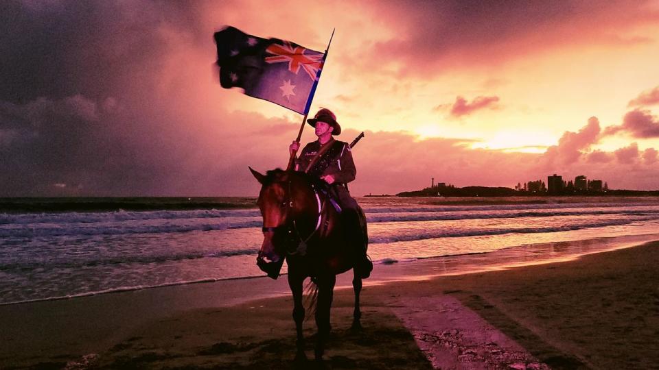 Lone horseman Rusty and Jack at the Mooloolaba Anzac Day Dawn Service. Picture: Vicki Keegan