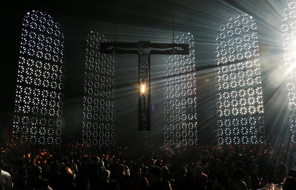 Pilgrims pray at the Basilica of Our Lady of Aparecida