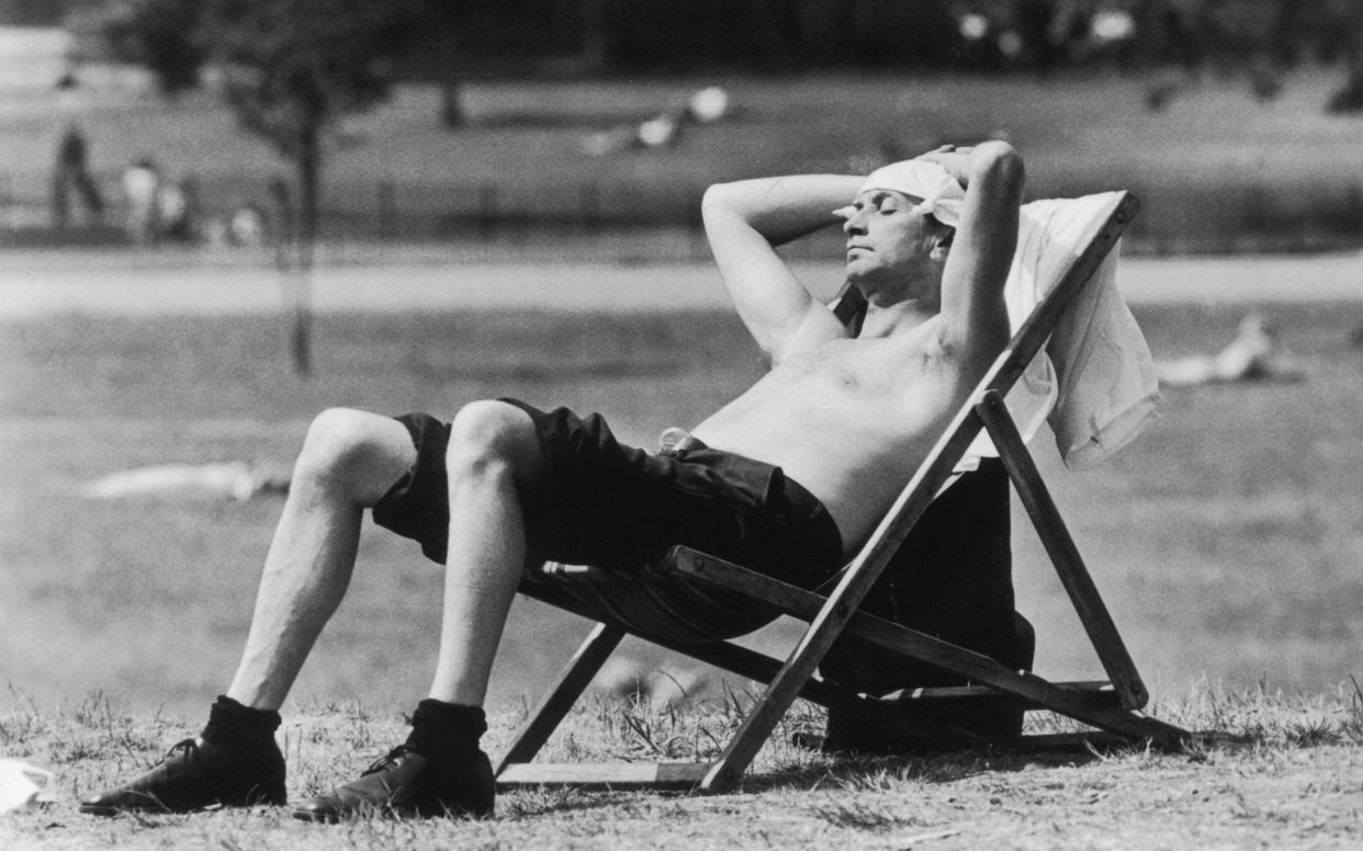 A sunbather in Kensington Gardens in London during the other great heatwave of 1976  - Hulton Archive