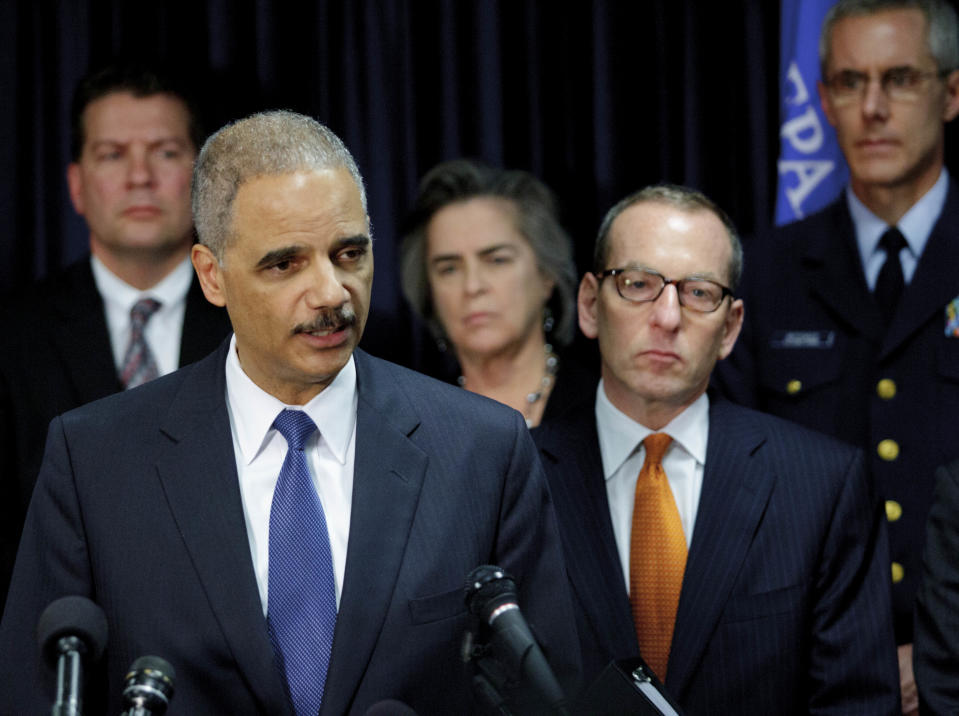 U.S. Attorney General speaks about the 2010 Gulf Oil Spill settlement and criminal penalties at 400 Poydras Tower in the Central Business District of in New Orleans, La. Thursday, Nov. 15, 2012. Holder said the settlement and indictments aren't the end of federal authorities' efforts and that the criminal investigation is continuing. Holder says much of the money BP has agreed to pay will be used to restore the environment in the Gulf. (AP Photo/Matthew Hinton)