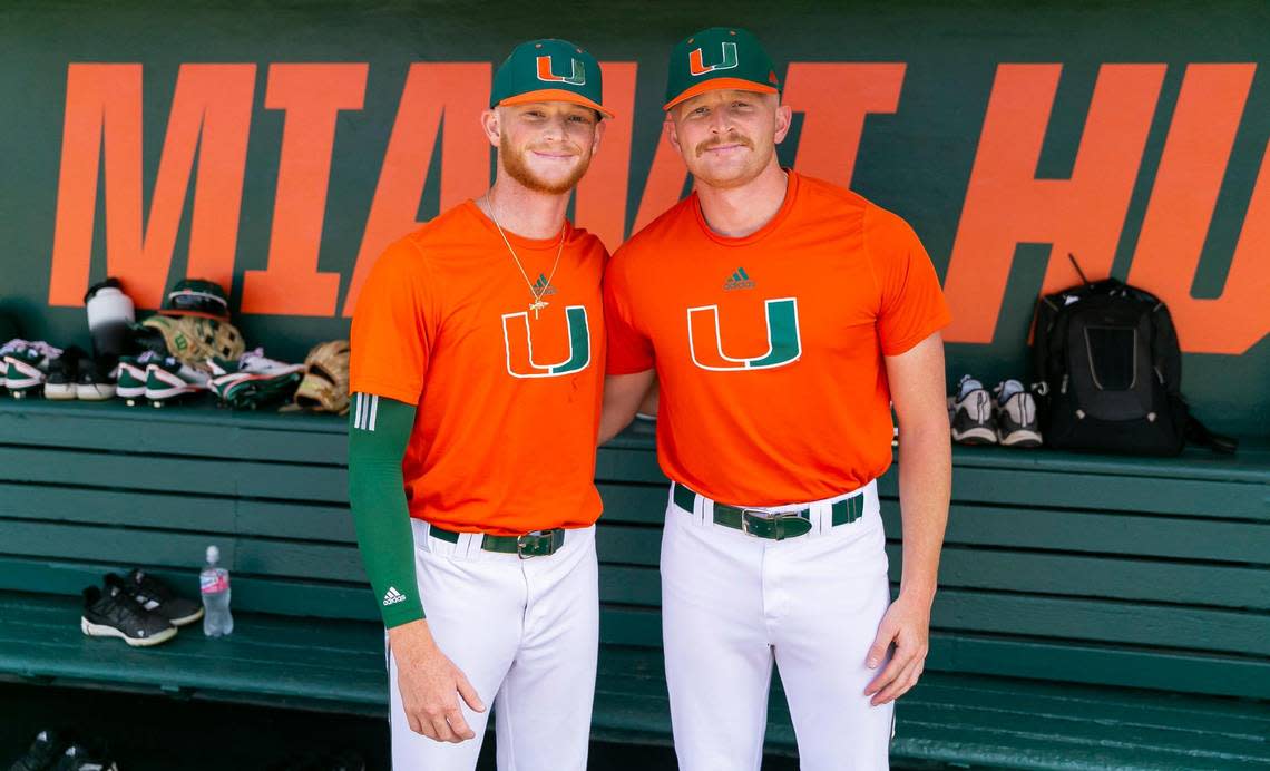 Miami Hurricanes pitchers Andrew Walters (21), right, and his brother, Brian Walters (10), are photographed during media day at Mark Light Field on Tuesday, Feb. 14, 2023, in Coral Gables, Fla. MATIAS J. OCNER/mocner@miamiherald.com