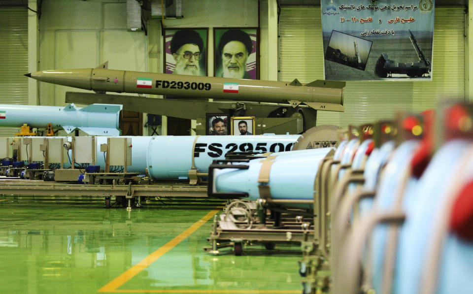 This photo released on Wednesday, March 5, 2014 by the Iranian Defense Ministry, purports to show missiles Fateh-110, top, and Persian Gulf, bottom, in an undisclosed location in Iran. Iran's powerful Revolutionary Guard on Wednesday said it had acquired missiles with multiple warheads, the latest armaments advance to be claimed by the Islamic Republic. At a ceremony Wednesday, Defense Minister Hossein Dehghan presented a delivery of four types of ballistic missiles - named Qiam, Qadr H1, Fateh-110 and Persian Gulf. (AP Photo/Iranian Defense Ministry)