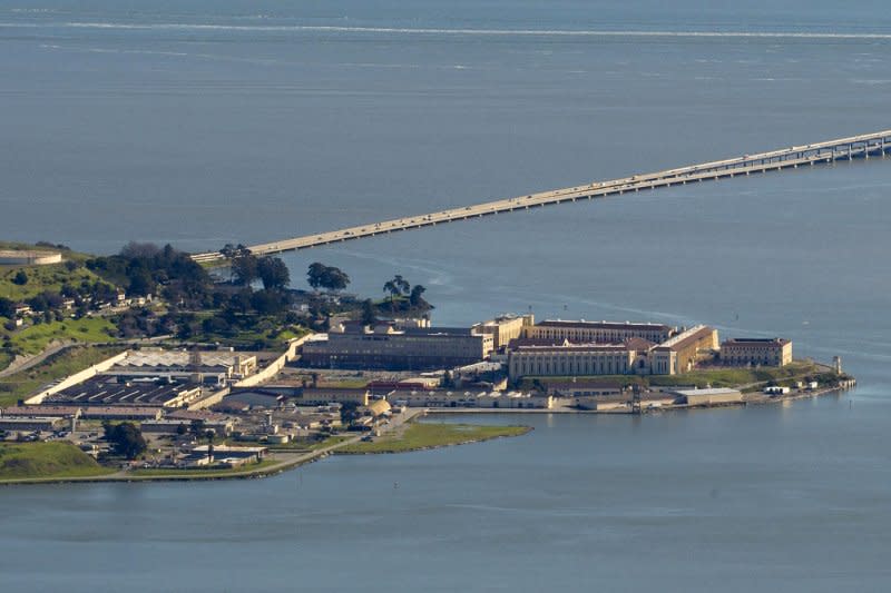 San Quentin State Prison, viewed from the top of Mount Tamalpias, is seen below the Richmond-San Rafael Bridge in Marin County, California on February 18, 2019. On May 23, 2011, the U.S. Supreme Court upheld a lower court ruling that California's overcrowded prisons violated the Eighth Amendment banning "cruel and unusual punishment." File Photo by Terry Schmitt/UPI